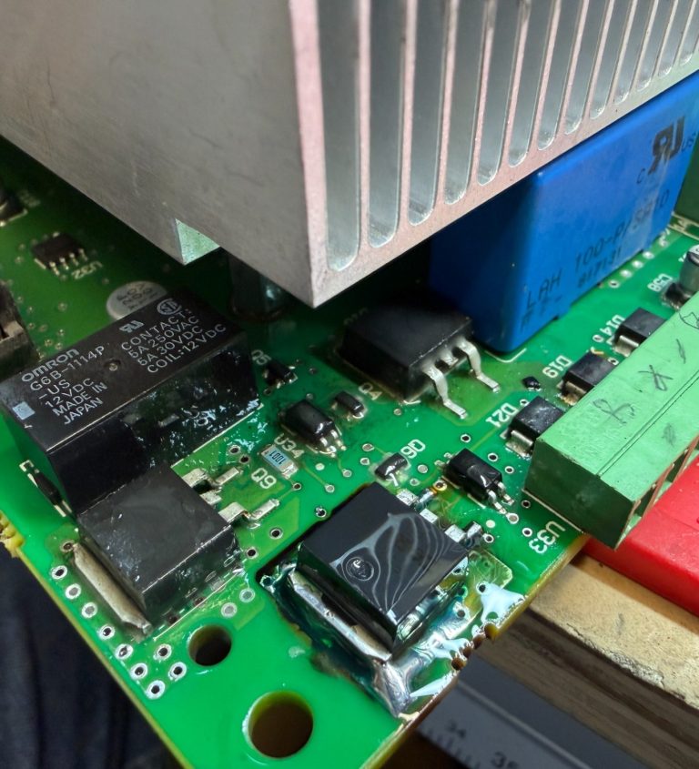 Mitsubishi PLC being repaired Mitsubishi PLC dismantled for repair